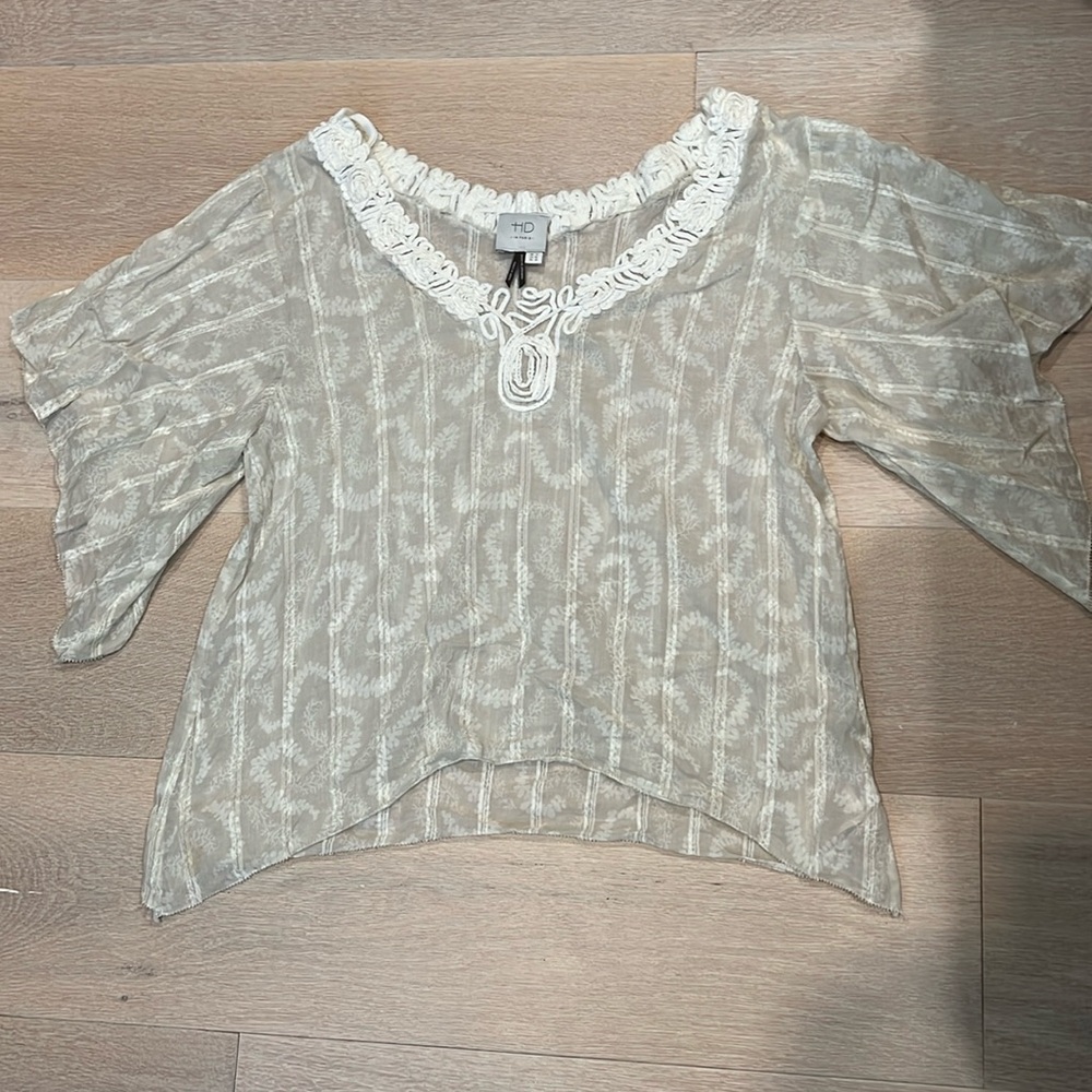 Lovely light beige floral accented top from